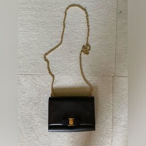 Authentic Ferragamo small crossbody chain bag. Black. Perfect condition.